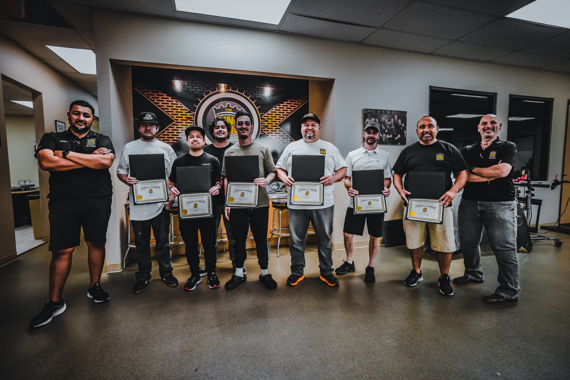 Ding King Training Institute graduates celebrating the completion of their reconditioning training